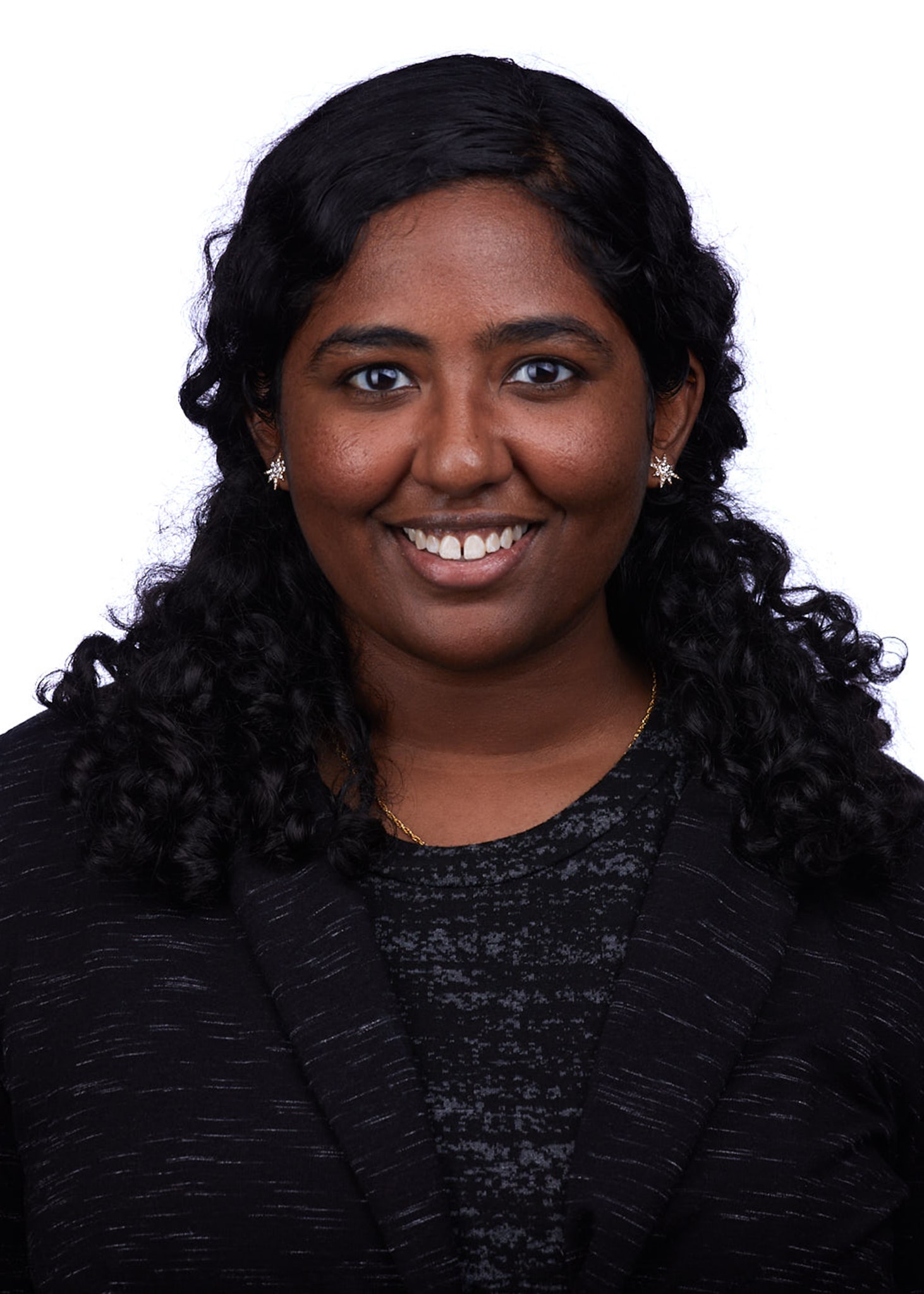 Headshot of Atesede Makonnen in front of a white background. 