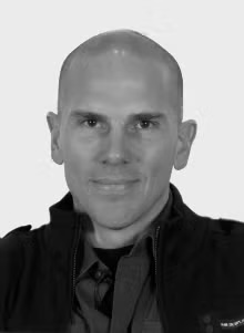 Black and white headshot of Marcel O'Gorman