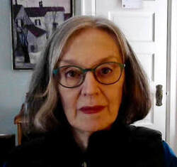 Color headshot of Carolyn Korsmeyer wearing glasses.