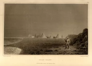 A man stands on the shore of a foggy island