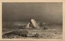 A camp is set up in a foggy icescape