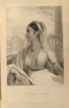 An Indian woman in bridal clothing